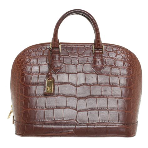 borsa louis vuitton pelle di coccodrillo|Borse Louis Vuitton: perché la Petite Malle è must have.